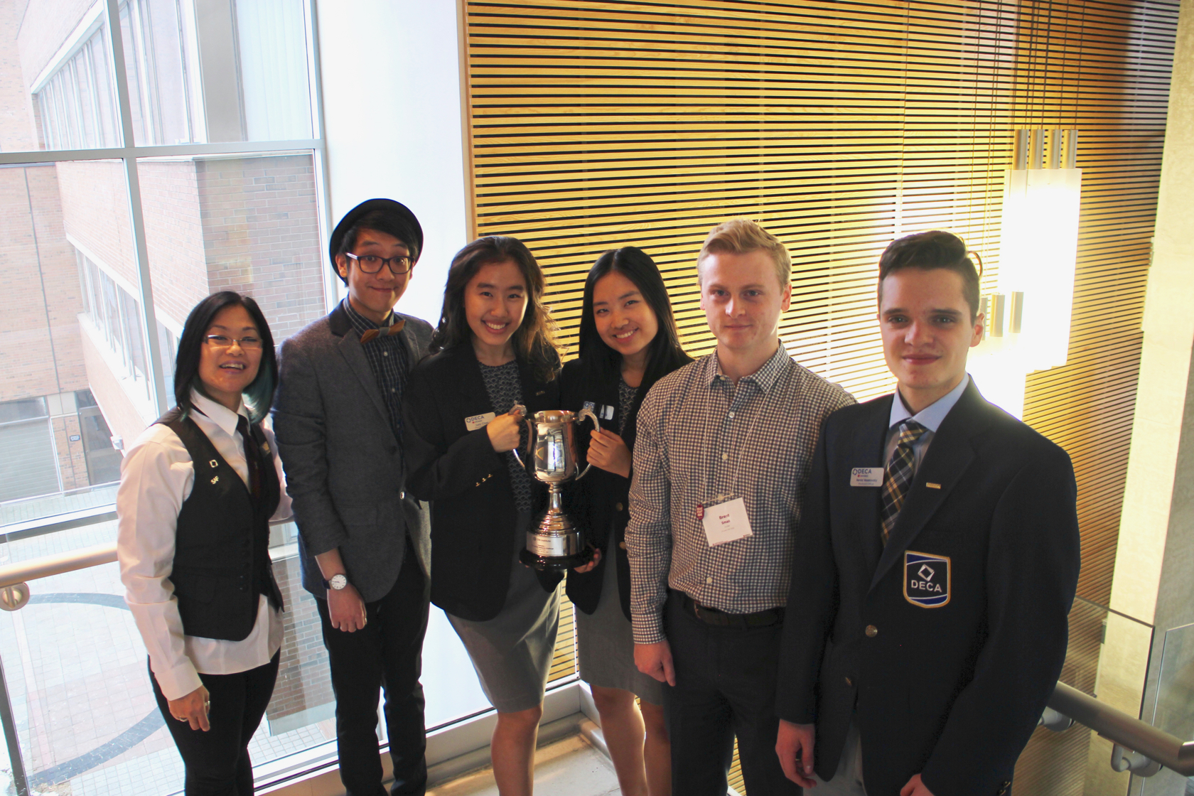 Marco, Extempra's founder, posing with Brad (the other keynote speaker) along with the SAF & DECA teams